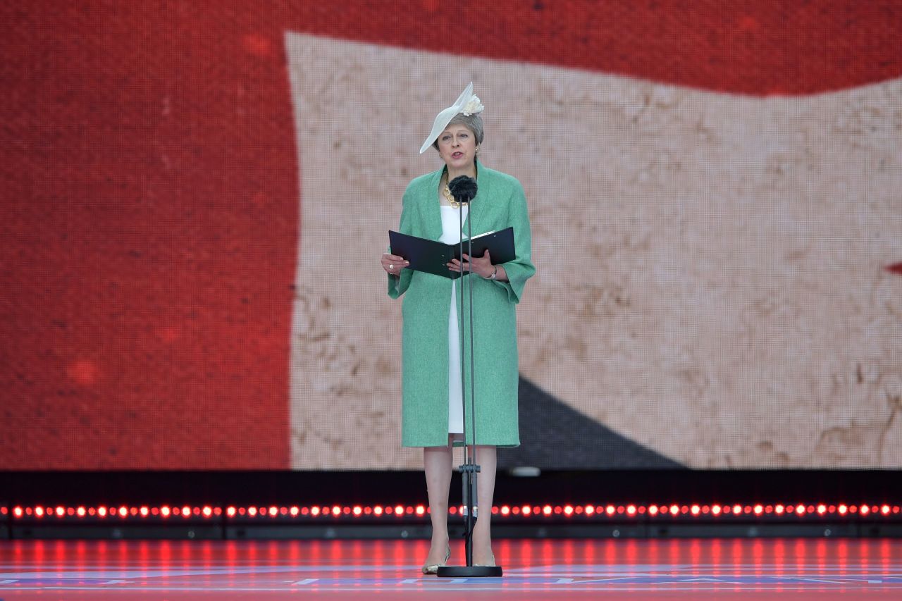 UK Prime Minister Theresa May reads an extract.