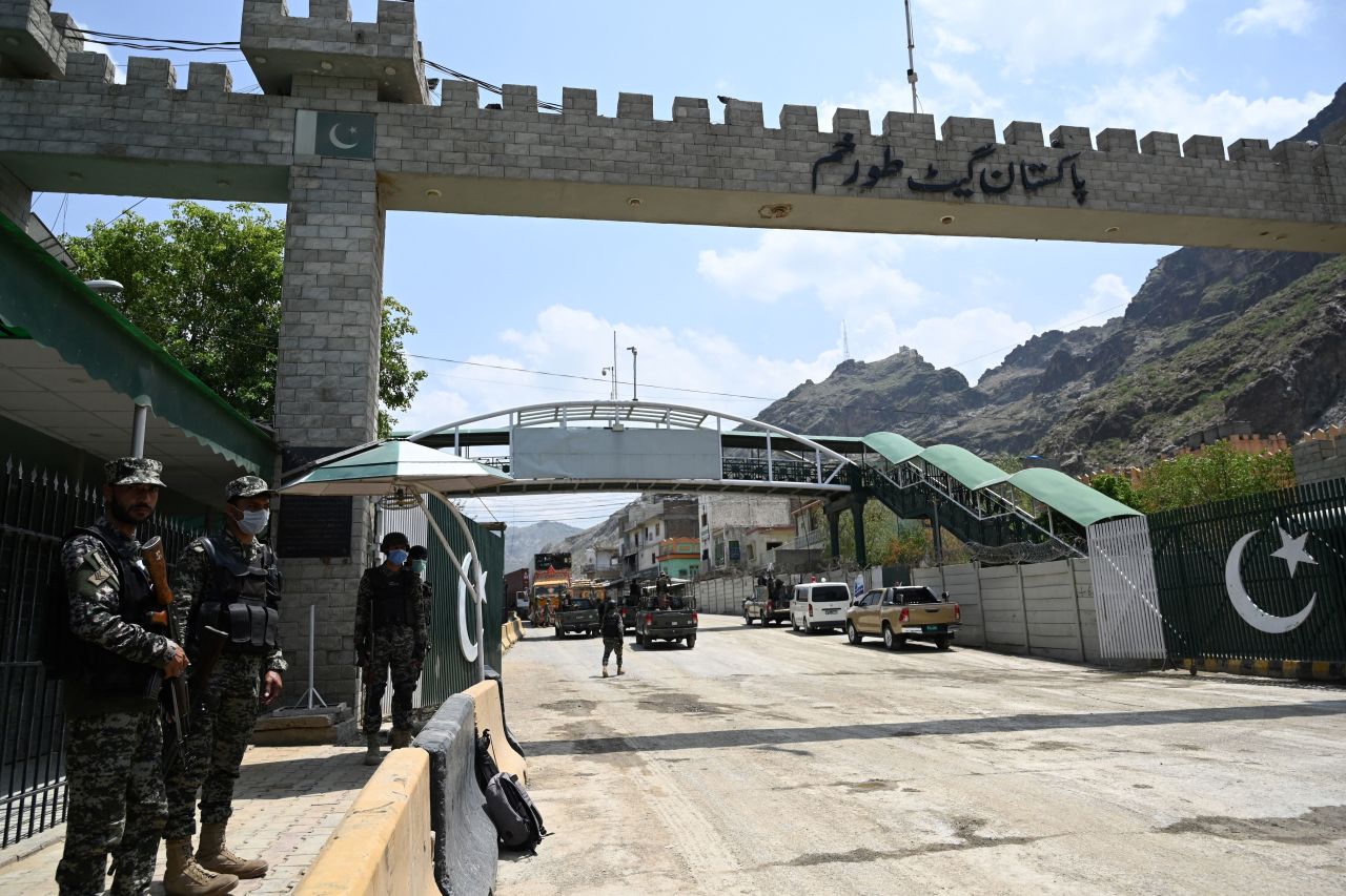 Pakistani paramilitary soldiers stand at the Torkham border crossing on August 3, 2021. 