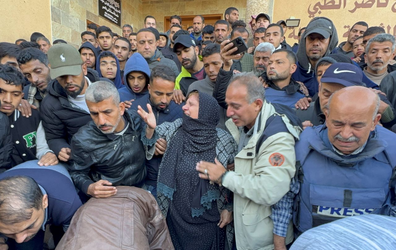 Mourners react in Khan Younis on Saturday.