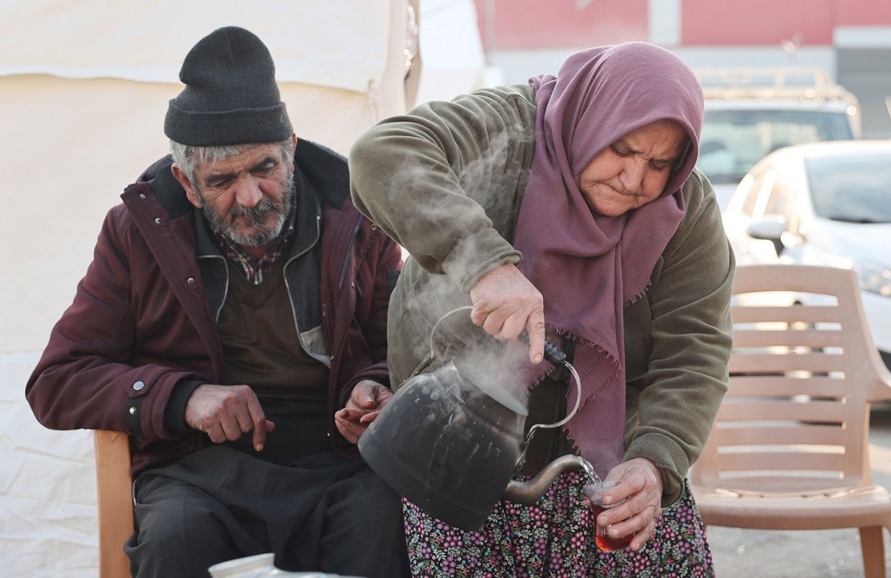 Earthquake survivors settle in the tent city set up near Hatay Stadium in Turkey on Friday. 