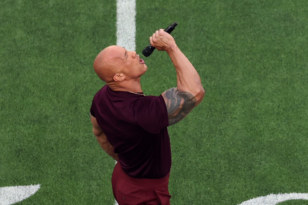 Dwayne "The Rock" Johnson introduces the two teams before kick off.