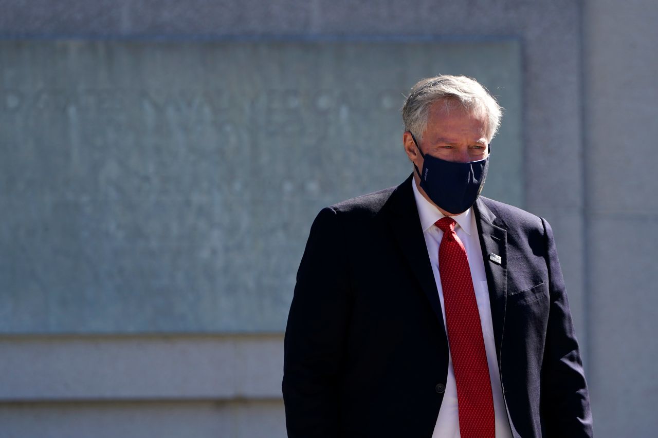 White House Chief of Staff Mark Meadows walks outside Walter Reed medical center in Bethesda, Maryland, on October 3.