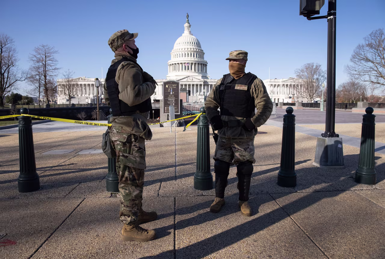DC National Guard guardsmen stand outside the Capitol on January 7 in Washington, DC. 
