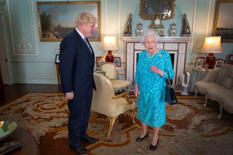 Johnson and the Queen on the day he became Prime Minister.