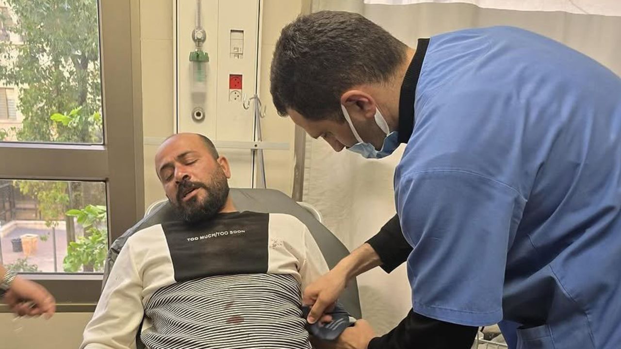 This photo shared on Instagram by Basel Adra shows Hamdan Ballal receiving treatment at a hospital in Hebron.