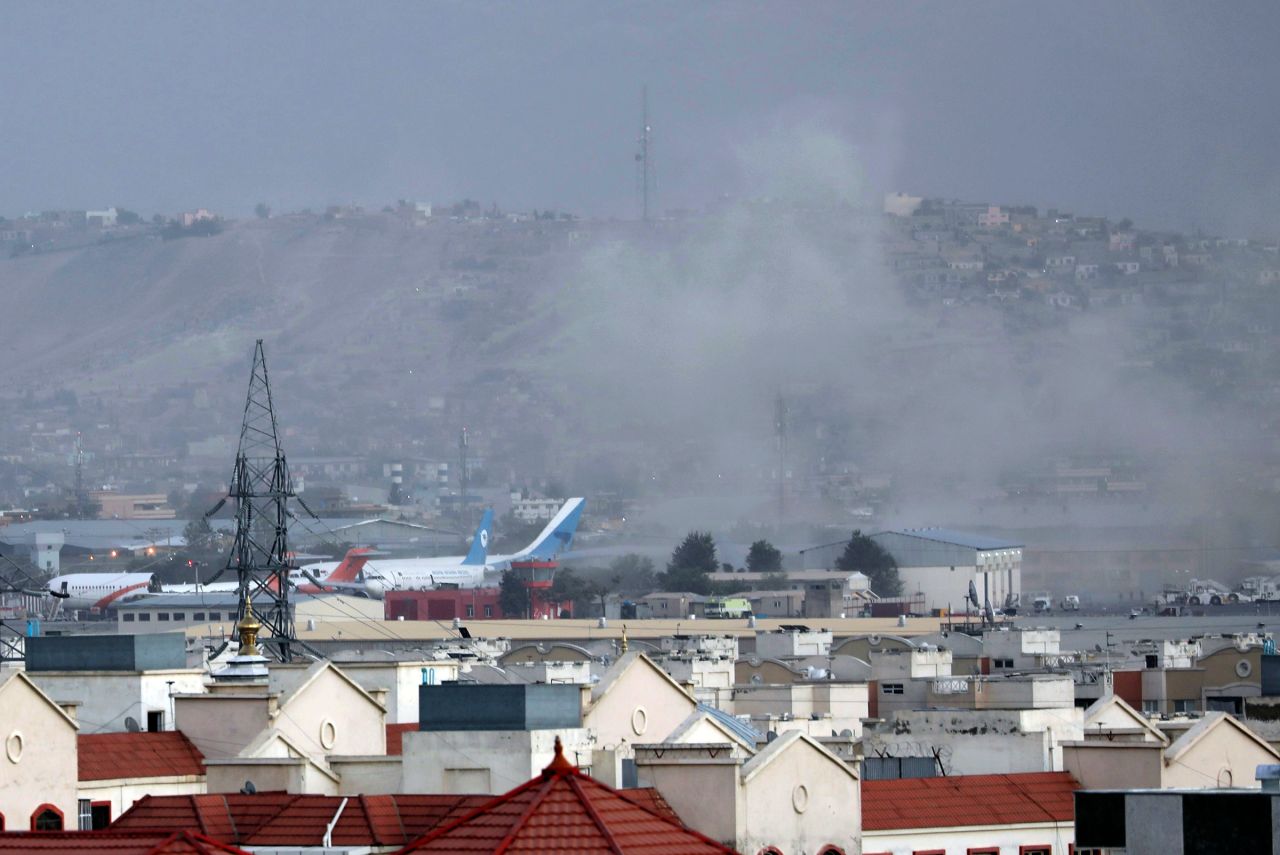 Smoke rises from a deadly explosion outside the airport in Kabul, Afghanistan, on Thursday, August 26. 