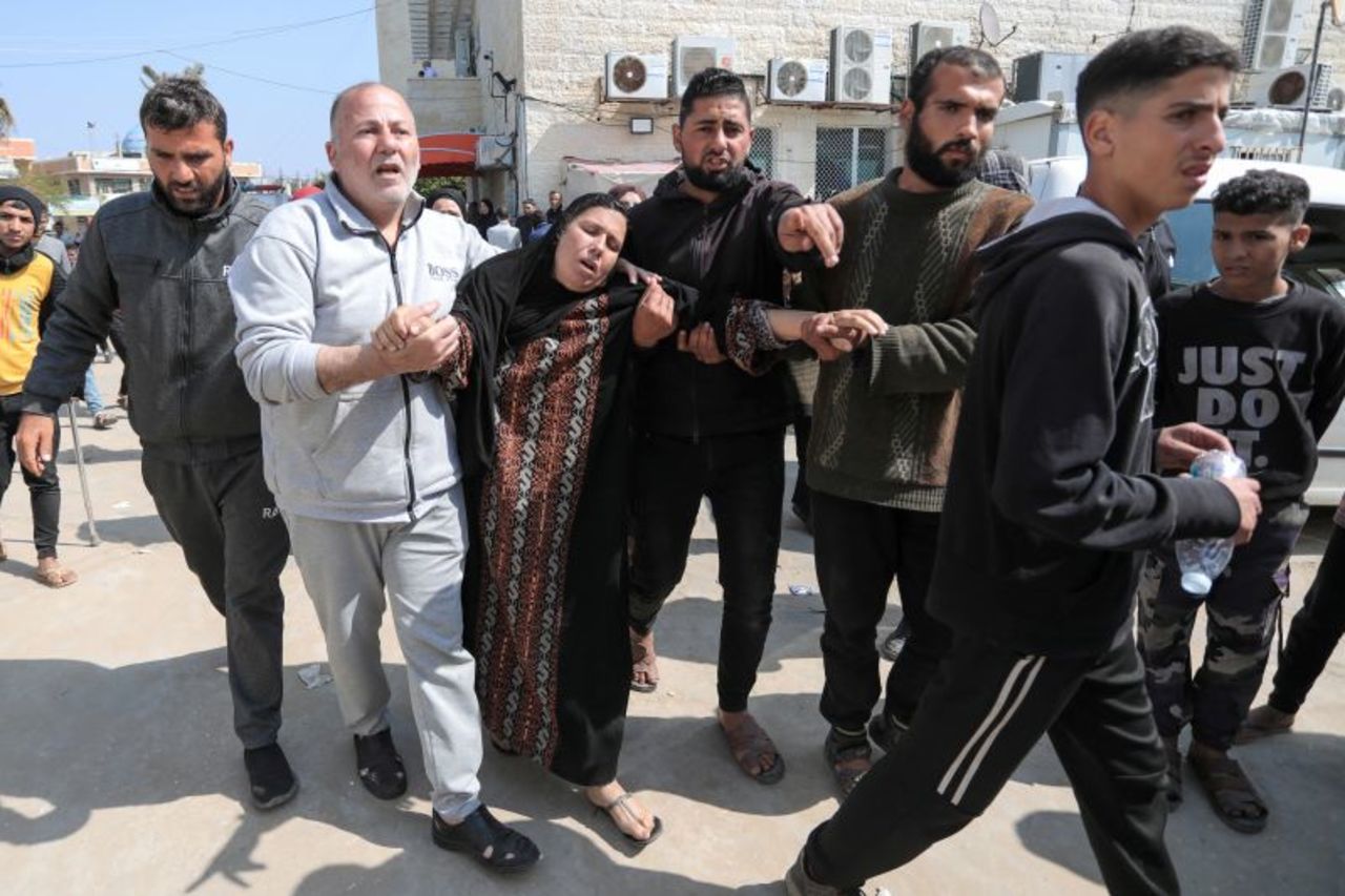 A woman mourns a loved one killed during Israeli bombardment, outside Al-Aqsa hospital in Deir el-Balah, central Gaza on February 28.