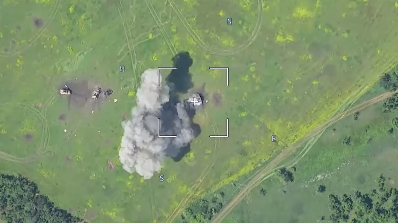 Drone footage, released June 5 by the Russian Defense Ministry shows a burning armored vehicle in an unidentified location.