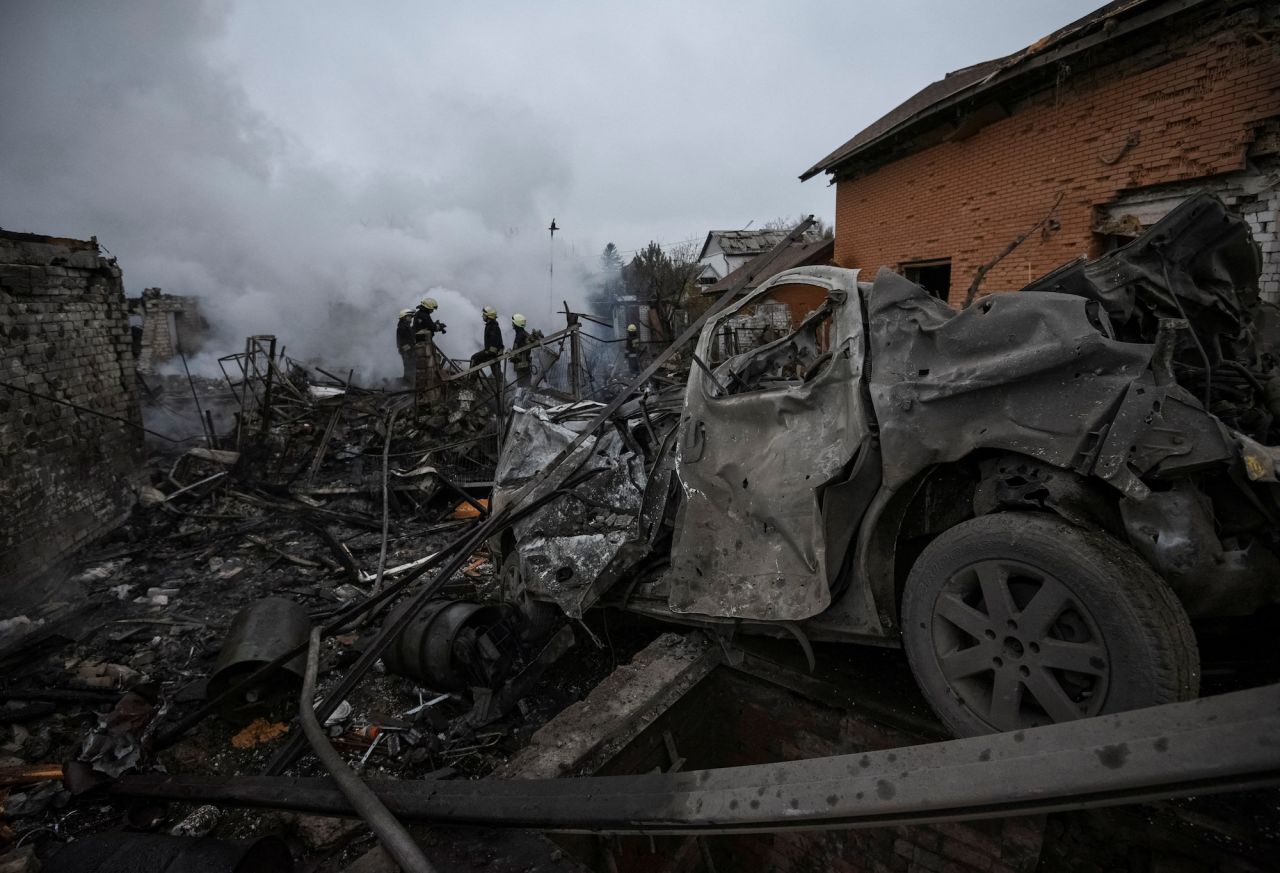 Rescue crews work on a site heavily damaged by a Russian missile strike in?Dnipro on Saturday. 