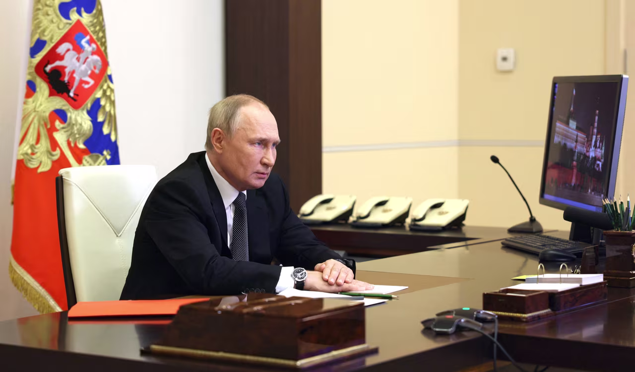 Russian President Vladimir Putin chairs a Security Council meeting via a video link at the Novo-Ogaryovo state residence outside Moscow on October 19.