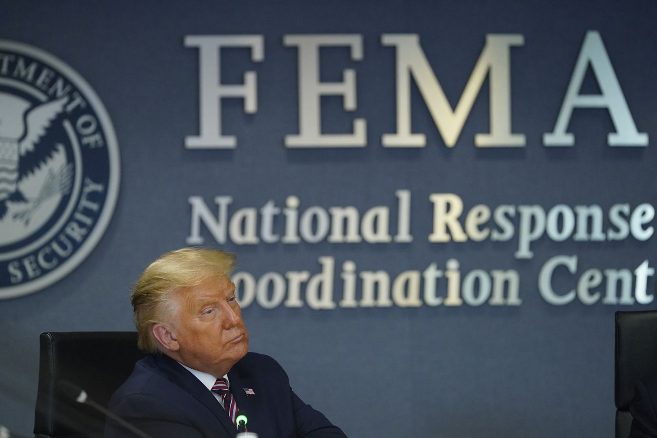 President Donald Trump listens during a meeting at the Federal Emergency Management Agency (FEMA) headquarters in Washington on Thursday, August 27.