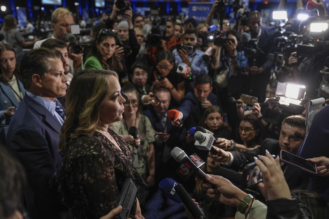 Former Trump officials, Anthony Scaramucci and Olivia Troye, who both support Harris, talk to reporters in the spin room before the debate.