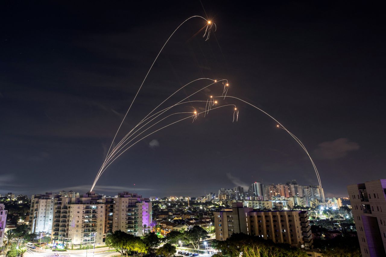 Israel's Iron Dome anti-missile system intercepts rockets launched from the Gaza, as seen from Ashkelon, on Sunday.