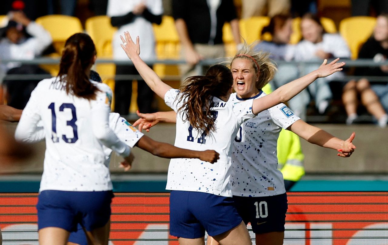 Lindsey Horan of the U.S. celebrates scoring their first goal with Andi Sullivan and teammates.