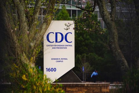 A security guard walks on the grounds of the Centers for Disease Control and Prevention headquarters in Atlanta, Georgia, on March 14.