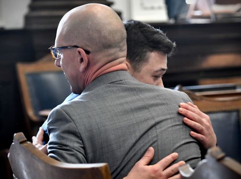 Kyle Rittenhouse hugs one of his attorneys Corey Chirafisi after he is found not guilty on all counts on Friday.