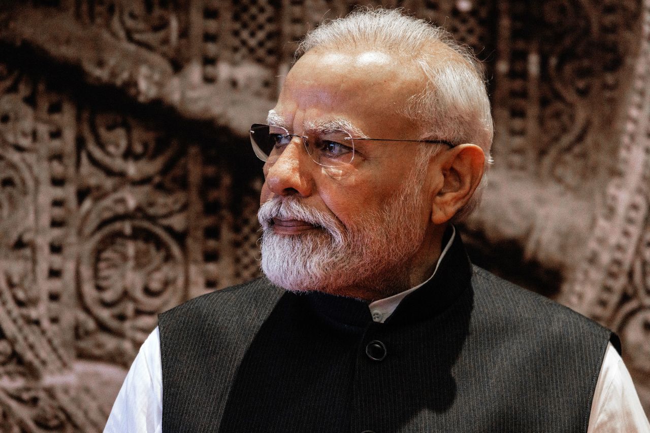India’s prime minister Narendra Modi waits to greet delegates to the G20 Leaders' Summit on September 9, 2023, in New Delhi.