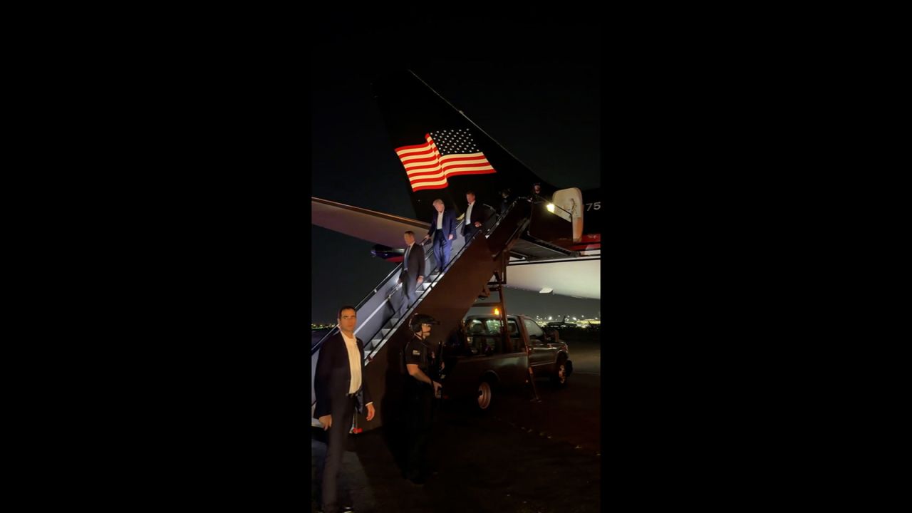 In a screengrab taken from a video, former President Donald Trump deplanes in Newark, New Jersey on July 14, following the shooting at his Butler, Pennsylvania campaign rally.