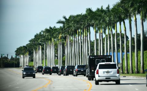 The motorcade carrying Trump is seen near the Trump International Golf Club West Palm Beach on Thursday.
