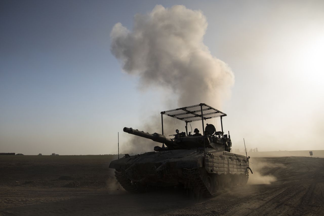 An Israeli tank moves along the border with Gaza on Sunday.