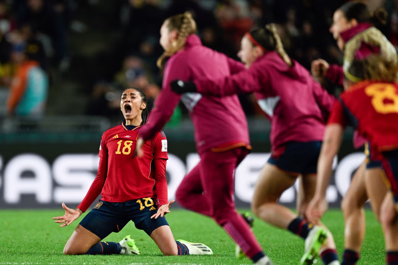 Spain's Salma Paralluelo celebrates as her teammates run onto the pitch after defeating Sweden in the Women's World Cup semifinal match.
