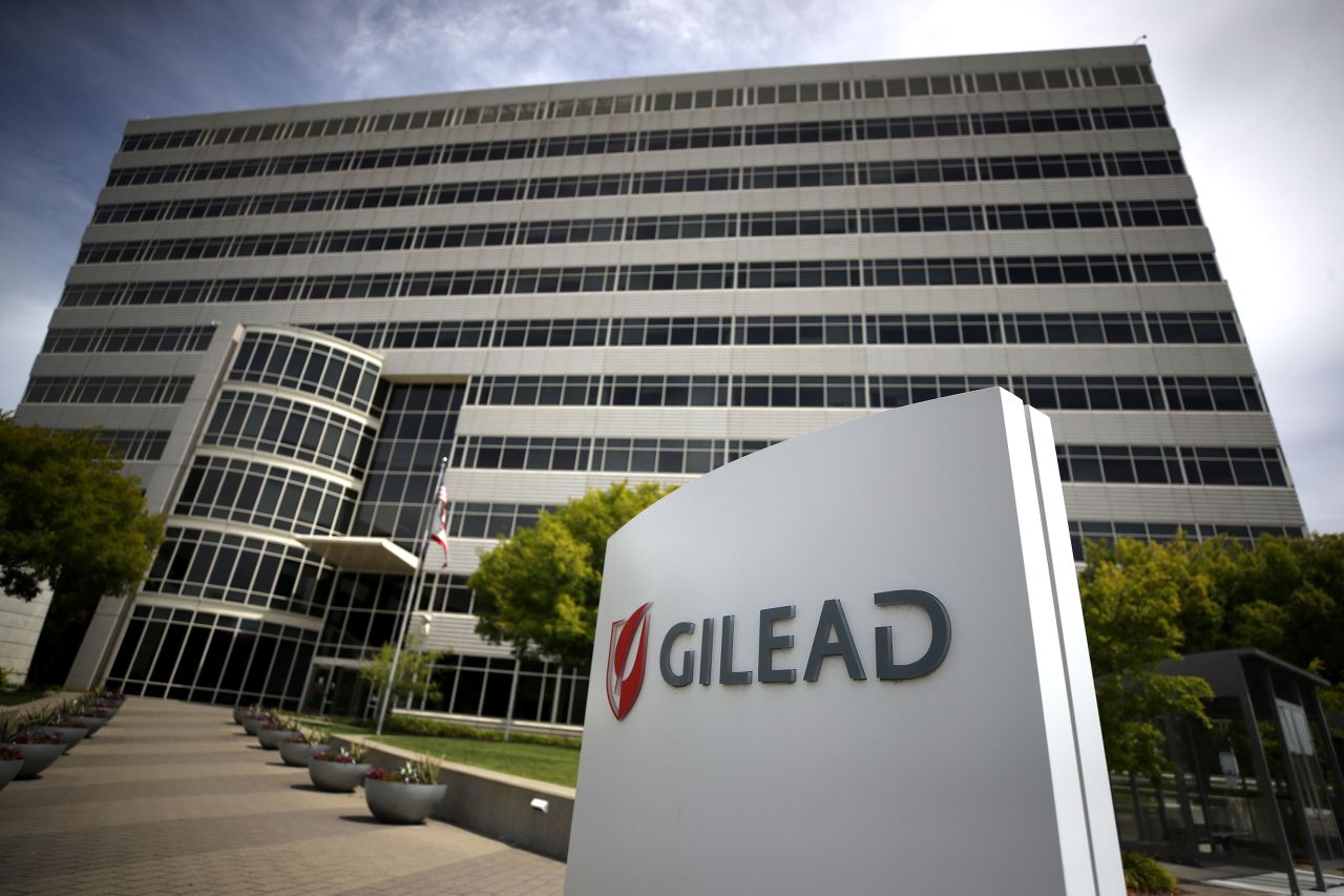 A sign is posted in front of the Gilead Sciences headquarters in Foster City, California. 