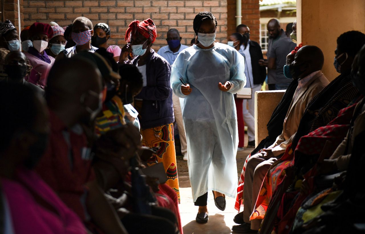 Numbers are handed out to people waiting to receive the AstraZeneca Covid-19 vaccine at a health center in Blantyre, Malawi, on March 29.