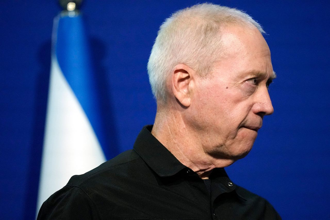 Yoav Gallant makes brief statements to the media at the Israeli Ministry of Defence on Tel Aviv, on October 16.