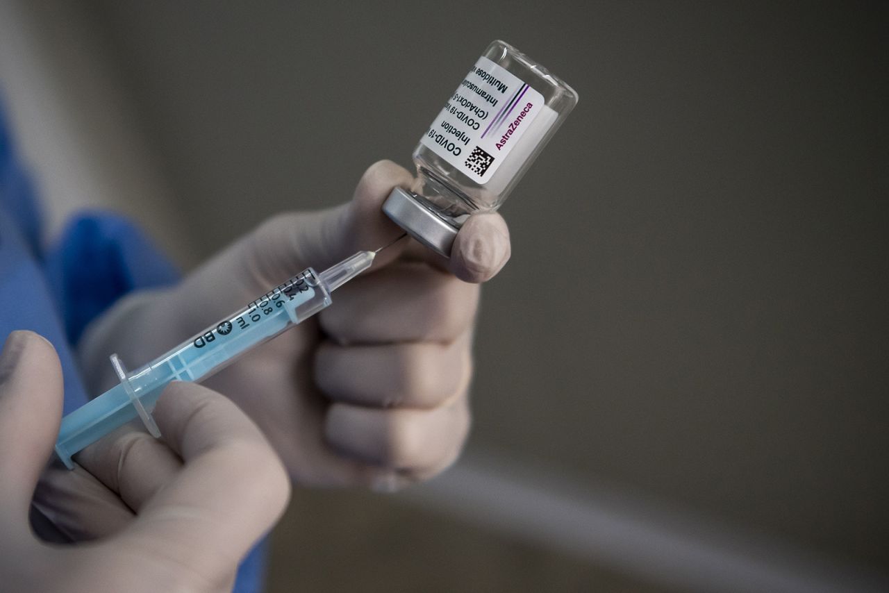 A healthcare worker of the Italian Army prepares doses of the AstraZeneca Covid-19 vaccine on March 5 in Rome.