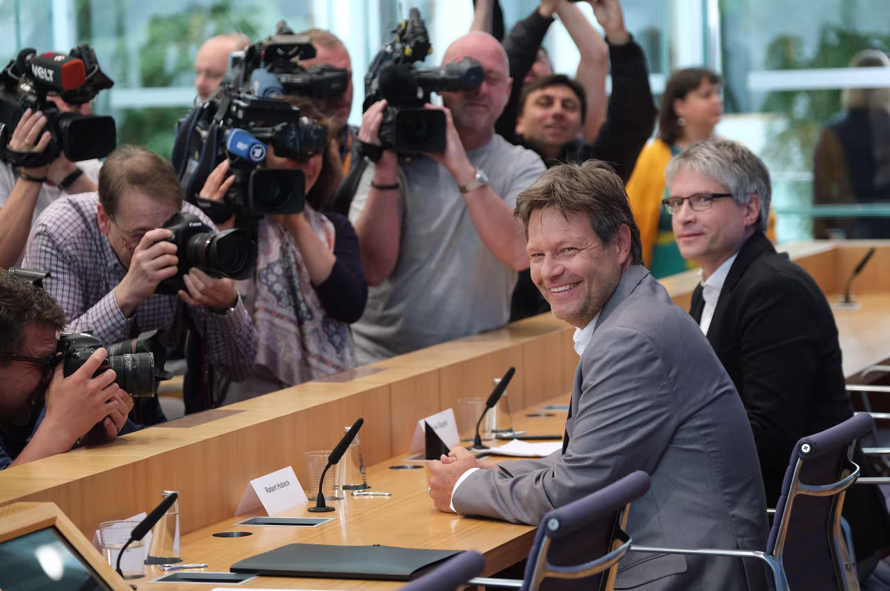 Robert Habeck (L), co-leader of the German Greens Party, speak after they became Germany's second strongest party in Germany's European elections. 
