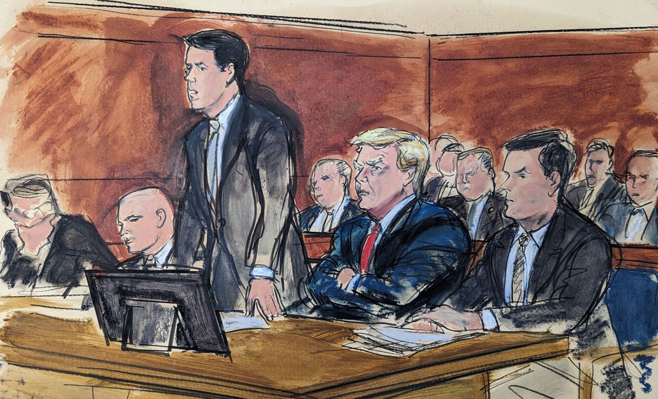 Todd Blanche, stands as he enters a plea of guilty on behalf of former President Donald Trump, center, Tuesday, June 13, in Miami.