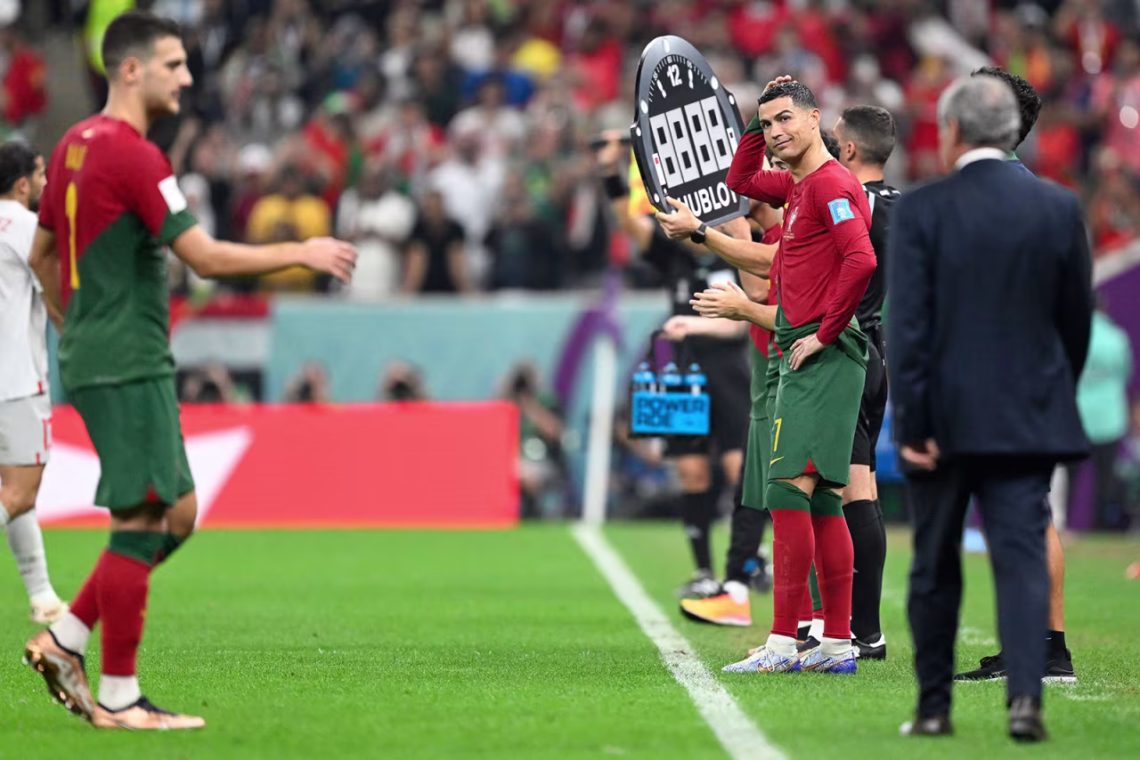 Ronaldo, right, prepares to enter the pitch during Tuesday’s match.