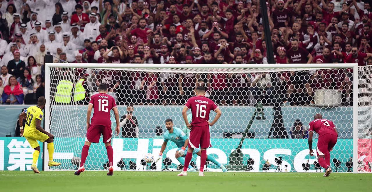 Ecuador's Enner Valencia scores the team's first goal from the penalty spot.