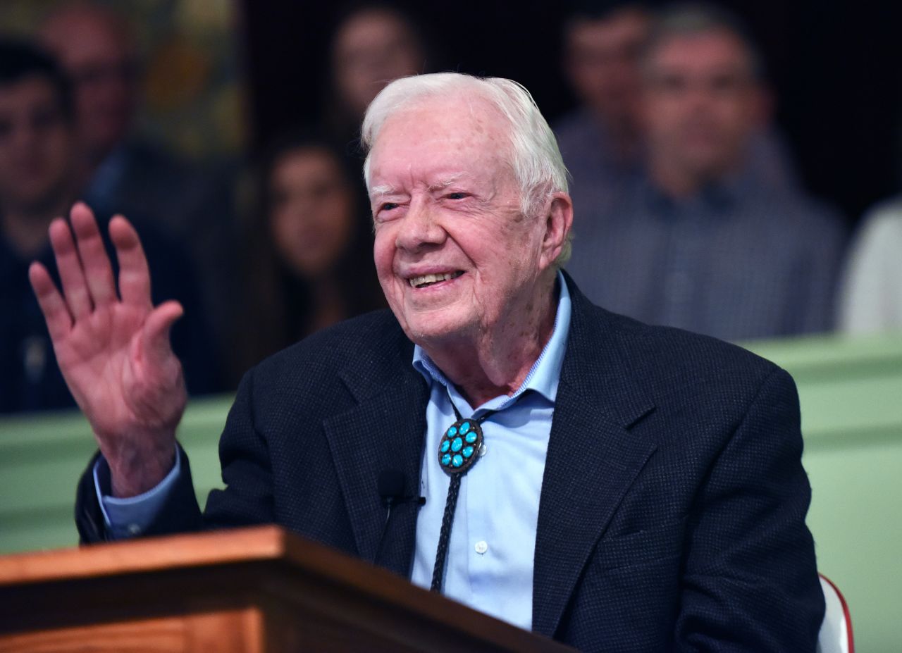 Former US President Jimmy Carter waves to the congregation after teaching Sunday school at Maranatha Baptist Church in his hometown of Plains, Georgia on April 28, 2019.