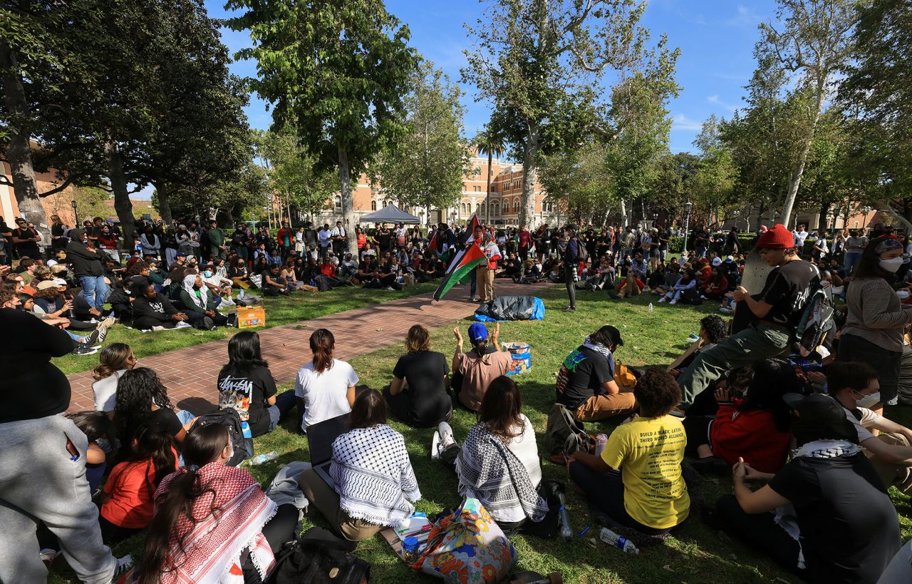 Demonstrators gather after students built a protest encampment in support of Palestinians at the University of Southern California's (USC) Alumni Park, during the ongoing conflict between Israel and the Palestinian Islamist group Hamas, in Los Angeles, California, U.S., April 24, 2024. 