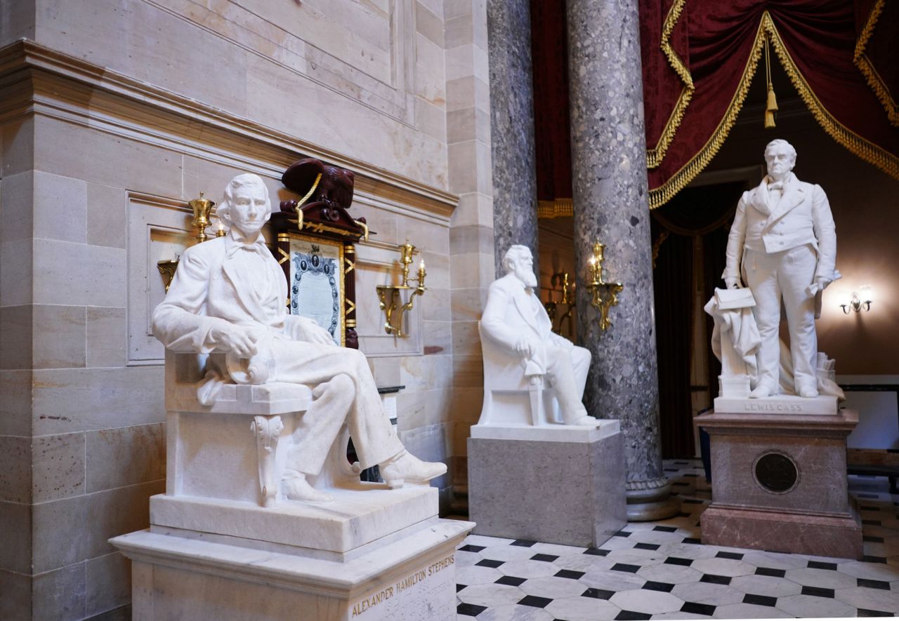 A statue of Alexander Hamilton Stephens (L), vice president of the Confederate States, by artist Gutzon Borglum is seen in Statuary Hall of the US Capitol in Washington on June 11.