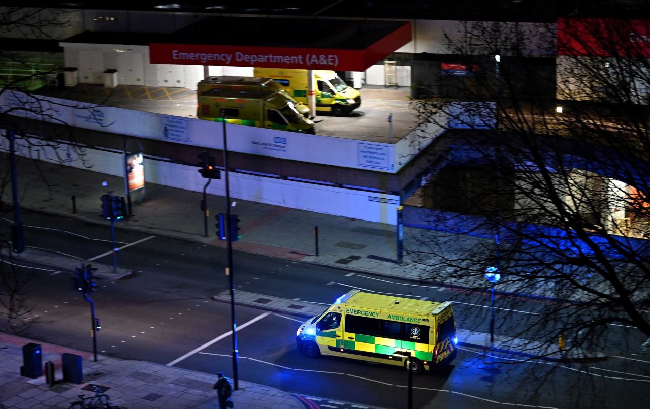 Paramedics from the British Emergency Ambulance Response Service (BEARS) transport a patient to Guy's and St Thomas' Hospital in London on January 7.