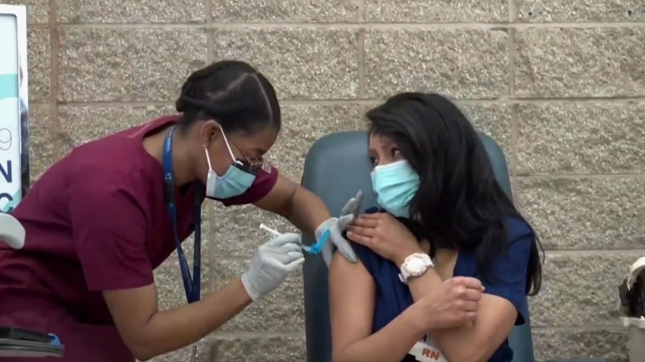 A Pfizer-BioNTech Covid-19 vaccine is administered at University Hospital in Newark, New Jersey, on December 15.