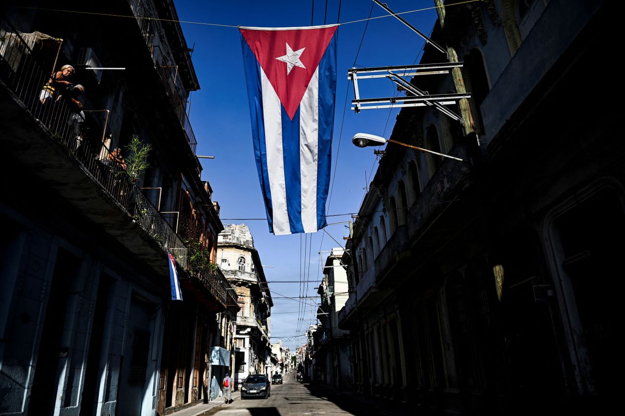 A Cuban flag hangs over a street in Havana, Cuba, on August 19, 2021.