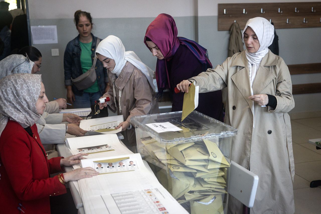 A woman casts her vote during Turkey's general election on May 14, in Istanbul, Turkey. 