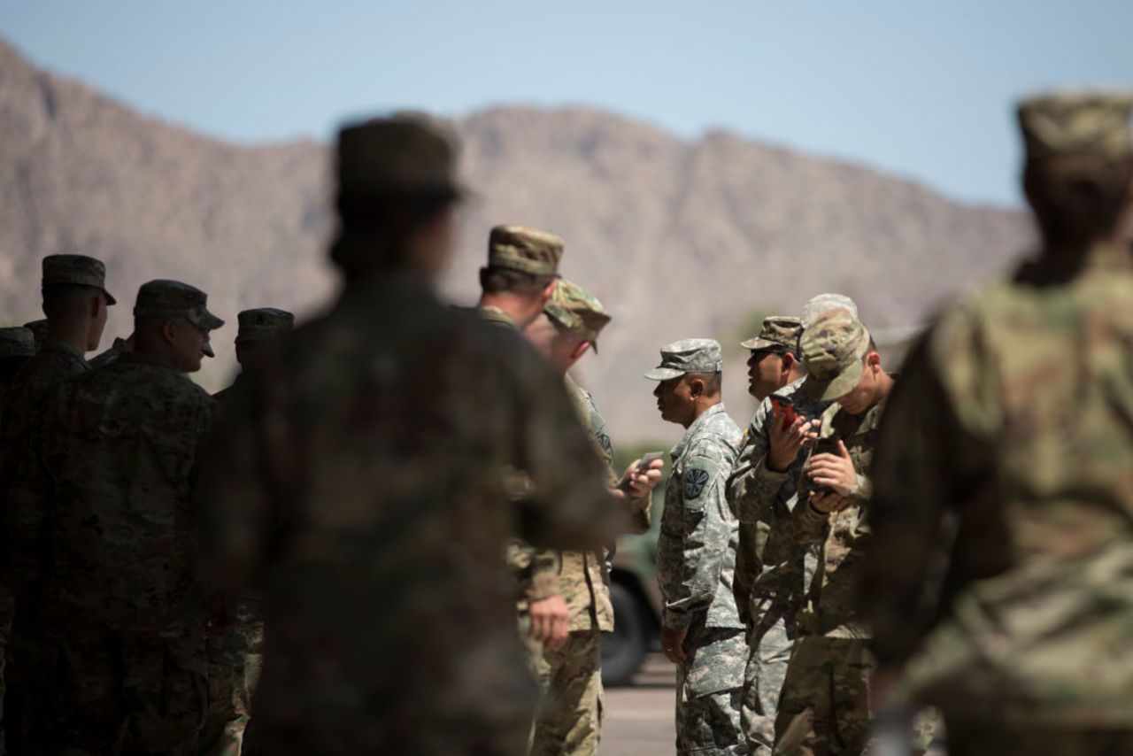 Members of the Arizona National Guard take a break on April 9, 2018 at the Papago Park Military Reservation in Phoenix.