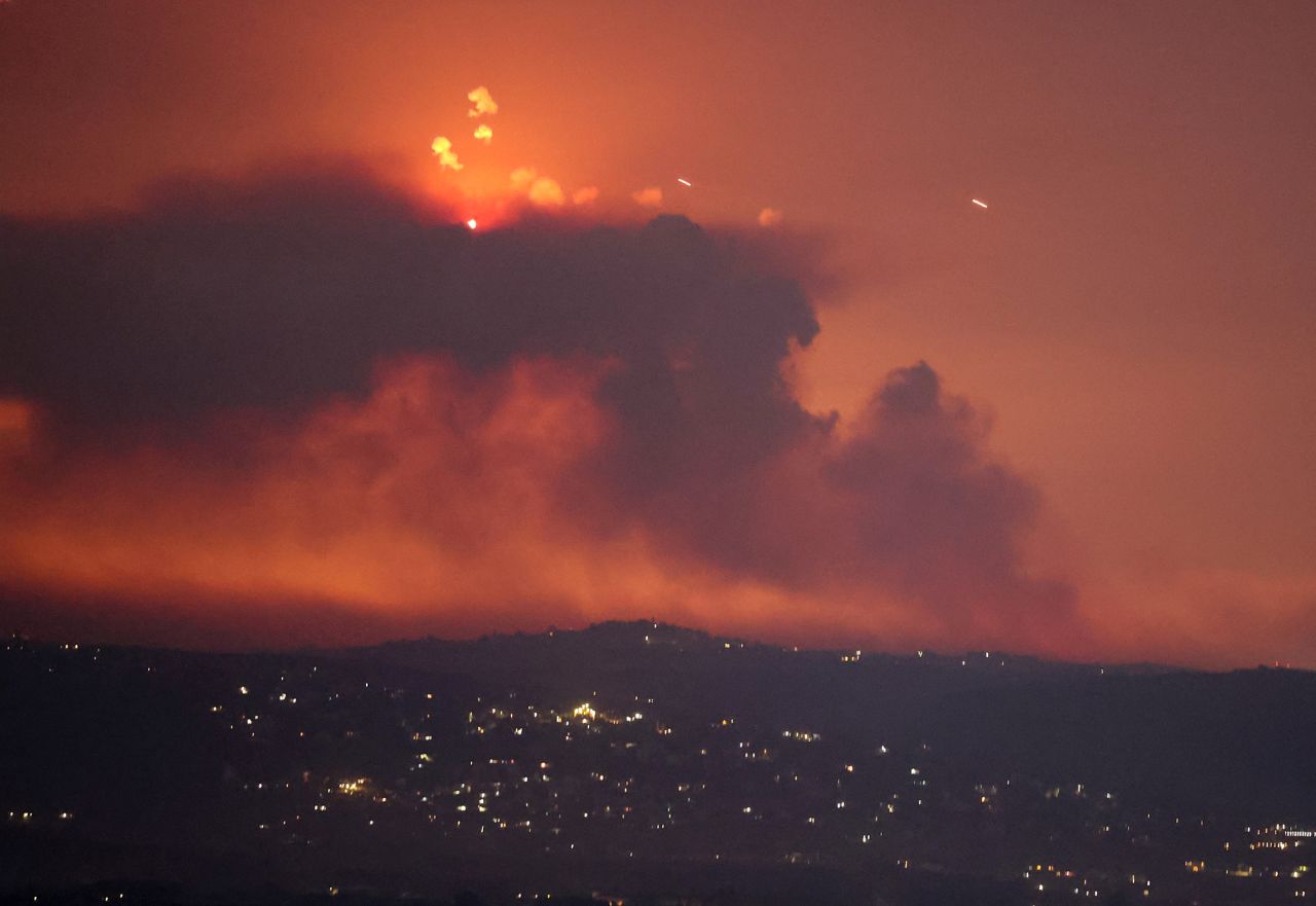 Smoke and fire are seen on the Lebanese side of the border with Israel, after Israel said it carried out strikes on Hezbollah targets in Lebanon on August 25. 