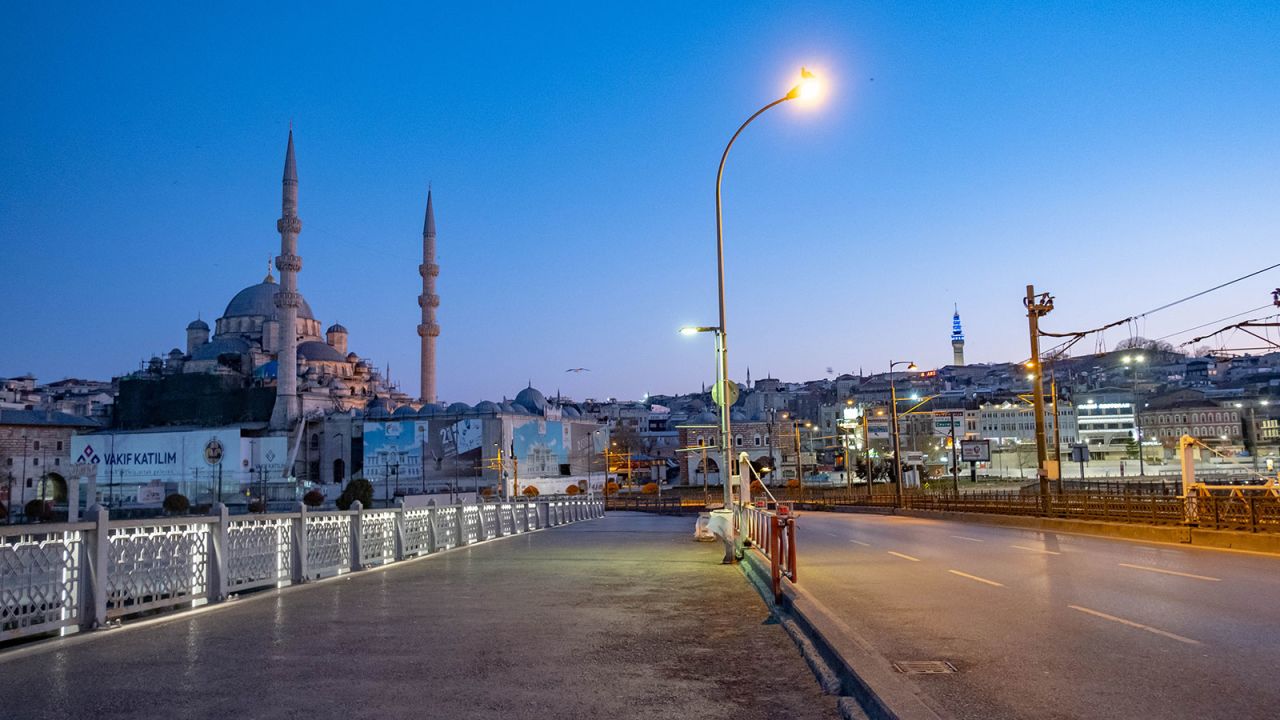 The Galata Bridge is deserted during the two-day curfew imposed by the Turkish government to halt the spread of the coronavirus in Istanbul, Turkey on April 12. 