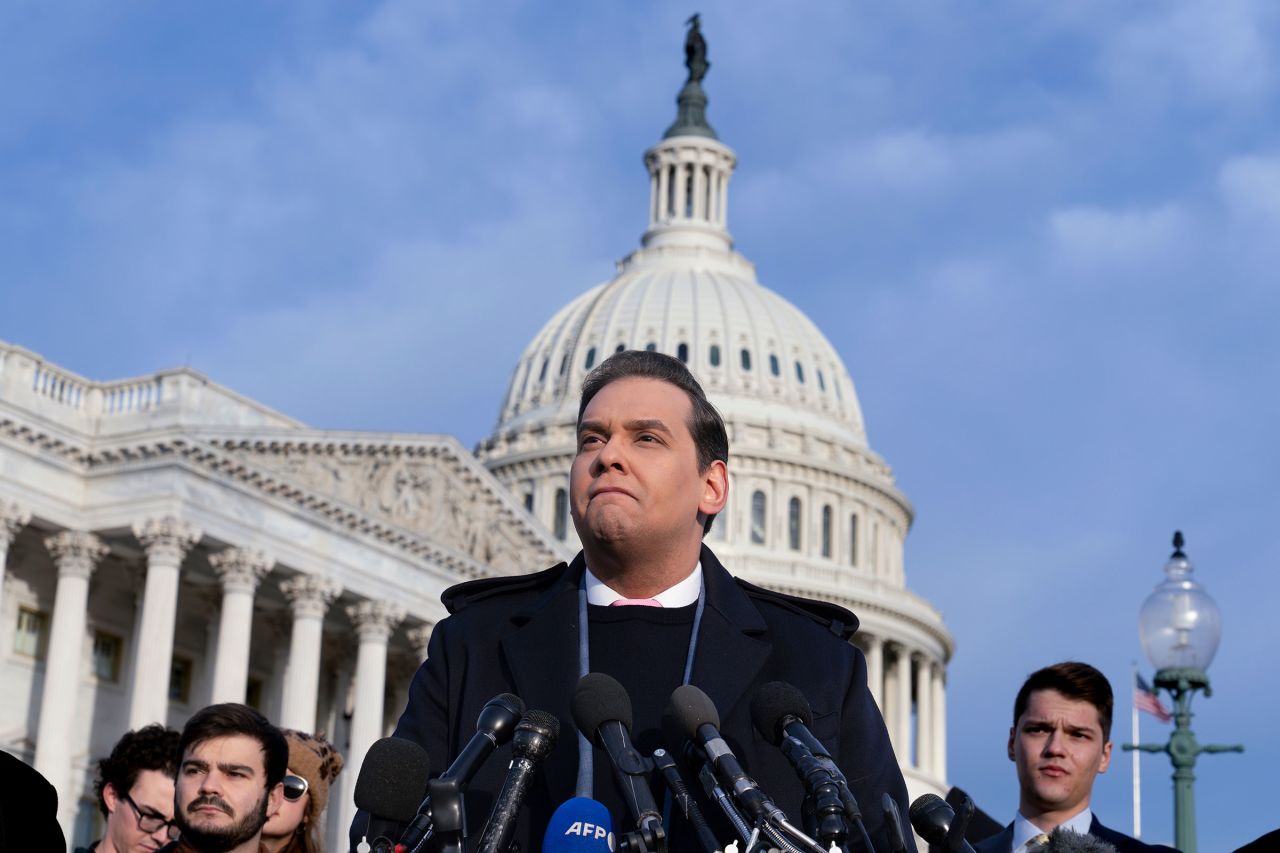 Rep. George Santos faces reporters at the Capitol in Washington, DC, on November 30.