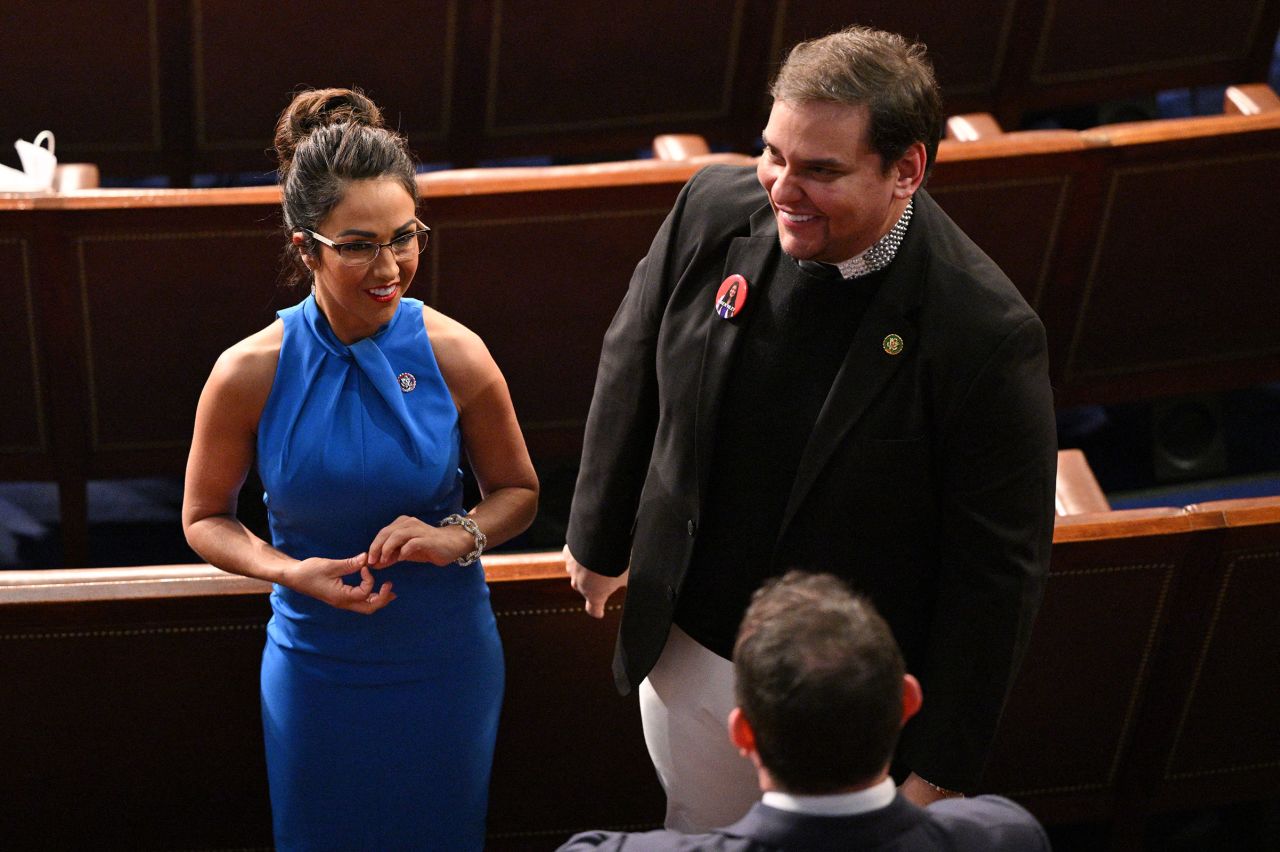 Rep. Lauren Boebert talks with George Santos ahead of US President Joe Biden's State of the Union address in the House Chamber of the US Capitol in Washington, DC, on March 7. 