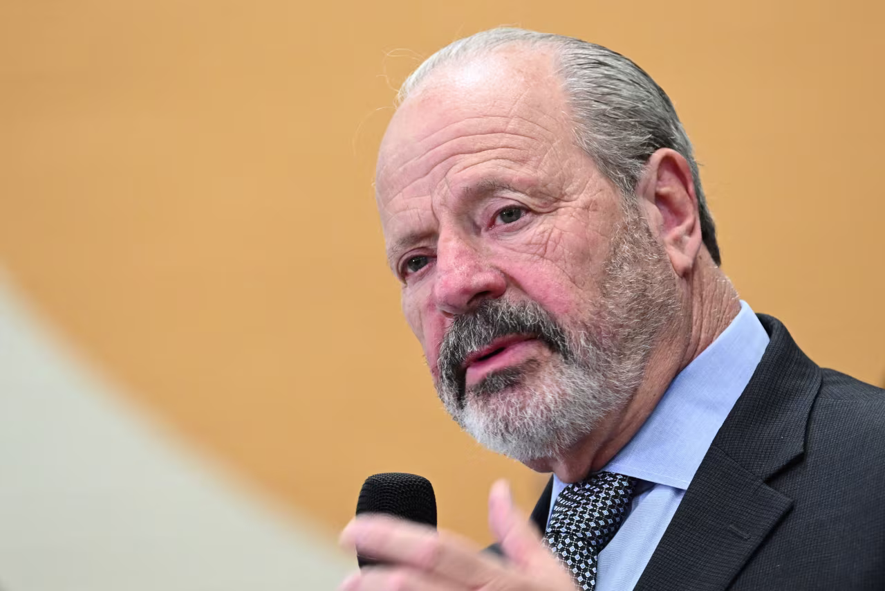 El Paso mayor Oscar Leeser speaks about a temporary shelter set up for processed migrants at the former Bassett Middle School in El Paso, Texas on Wednesday. 