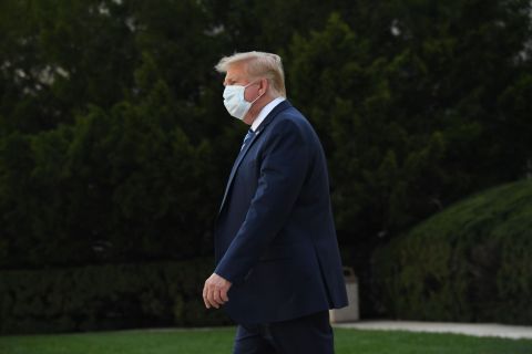 President Donald Trump leaves Walter Reed Medical Center in Bethesda, Maryland, heading towards Marine One on October 5.