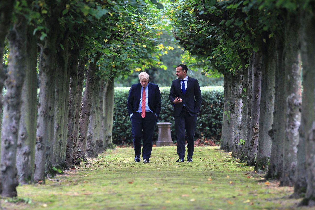 Boris Johnson and Leo Varadkar take a walk in the woods at Thornton Manor, northwest England.