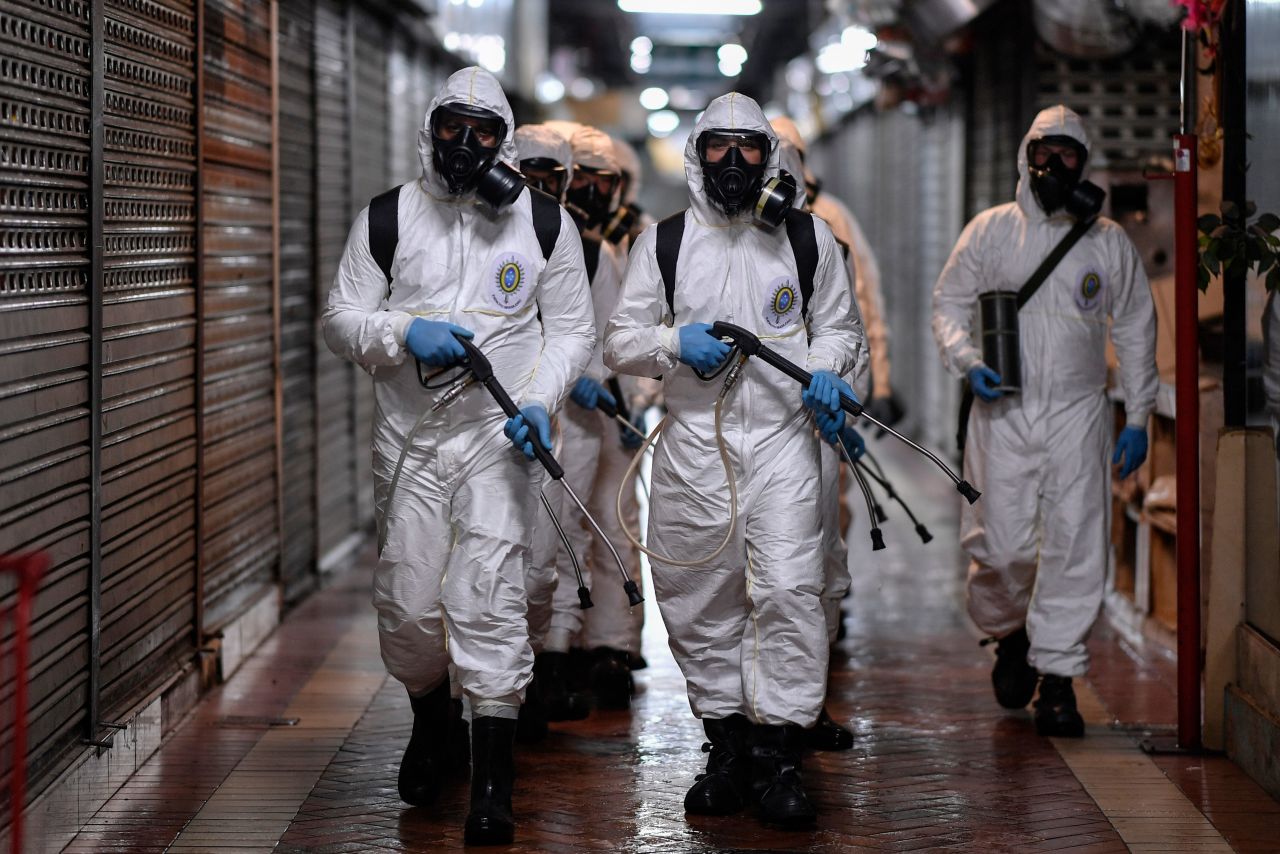 Soldiers from the 4th Military Region of the Brazilian Armed Forces take part in the cleaning and disinfection of the Municipal Market in the Belo Horizonte in Minas Gerais on August 18.