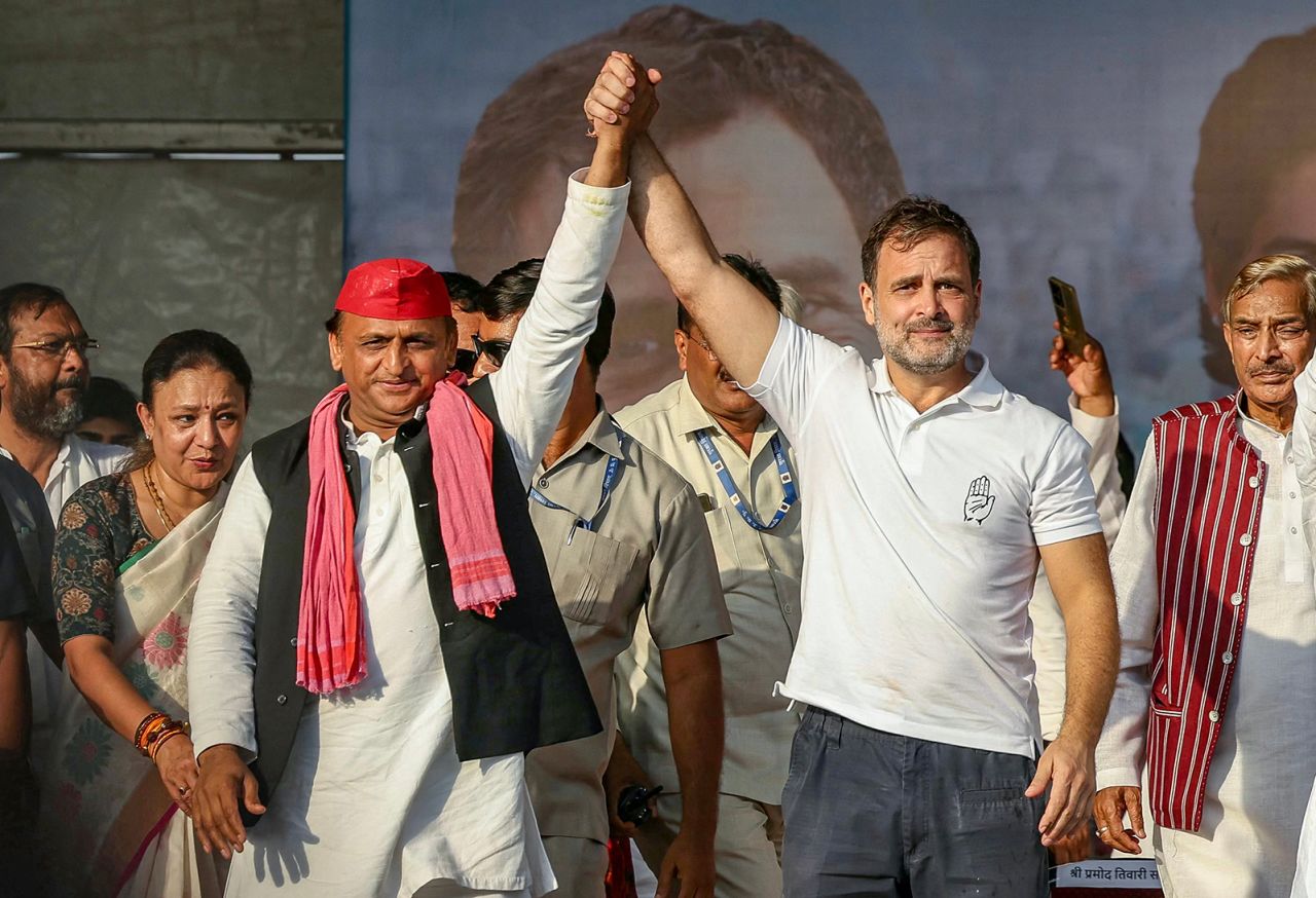 Indian National Congress (INC) Party leader Rahul Gandhi (2R) and Samajwadi Party President Akhilesh Yadav (C) attend an election rally of Indian National Developmental Inclusive Alliance (INDIA) on the outskirts of Varanasi on May 28. 